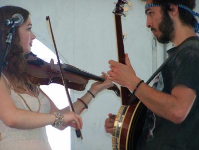 Kathleen Parks and Ricky Mier of the band Cat and the Moon share a duet during the Boston Irish Festival music weekend. 	Sean Smith photo